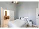 Bright bedroom space with a ceiling fan, and direct access to the dining area at 9109 Lazy Hill Cir, Las Vegas, NV 89117