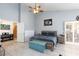 Bright, well lit main bedroom with a ceiling fan, ensuite and plenty of natural light at 9109 Lazy Hill Cir, Las Vegas, NV 89117
