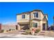 Two-story house showcasing a front yard, driveway, and a real estate sign at 9888 Abel Cliff St, Las Vegas, NV 89143