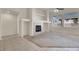 Living room with fireplace and carpet flooring at 1006 Christopher View Ave, North Las Vegas, NV 89032