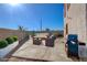 Private backyard with patio and built-in grill at 10484 Beautiful Fruit St, Las Vegas, NV 89183