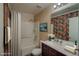 Clean bathroom with tub, shower, and updated vanity at 10484 Beautiful Fruit St, Las Vegas, NV 89183