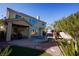 Home's backyard with a pool and patio area at 10500 Eagle Nest St, Las Vegas, NV 89141