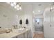 Modern bathroom with a large vanity and walk-in shower at 10500 Eagle Nest St, Las Vegas, NV 89141