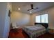 Bright bedroom with hardwood floors and a ceiling fan at 10500 Eagle Nest St, Las Vegas, NV 89141