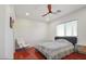 Bright bedroom with hardwood floors and ceiling fan at 10500 Eagle Nest St, Las Vegas, NV 89141