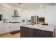 Spacious kitchen featuring stainless steel appliances and an island at 10500 Eagle Nest St, Las Vegas, NV 89141