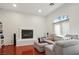 Cozy living room featuring a fireplace and comfortable seating at 10500 Eagle Nest St, Las Vegas, NV 89141