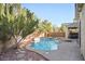 Inviting pool and spa with flagstone and landscaping at 10500 Eagle Nest St, Las Vegas, NV 89141