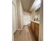 Bathroom with tub/shower and wood-look floors at 10550 W Alexander Rd # 2082, Las Vegas, NV 89129