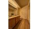 Double vanity bathroom with light wood cabinets at 10550 W Alexander Rd # 2082, Las Vegas, NV 89129