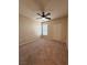 Bright bedroom with ceiling fan and carpet at 10550 W Alexander Rd # 2082, Las Vegas, NV 89129