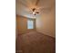 Spacious bedroom with ceiling fan and carpeted floors at 10550 W Alexander Rd # 2082, Las Vegas, NV 89129