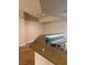 Kitchen island with granite countertop and double sink at 10550 W Alexander Rd # 2082, Las Vegas, NV 89129