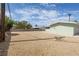 Large gravel backyard with ample space for outdoor activities at 1105 I, Boulder City, NV 89005