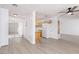 View of kitchen and living area with vinyl flooring and ceiling fan at 1105 I, Boulder City, NV 89005