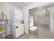 Stackable washer and dryer in a laundry room with access to backyard at 1105 I, Boulder City, NV 89005