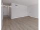 Spacious living room with light walls and wood-look flooring at 1105 I, Boulder City, NV 89005