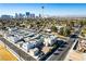 Aerial view of a new townhouse development with a city skyline backdrop at 1303 S 8Th St, Las Vegas, NV 89104