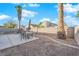 Private backyard with patio and seating area at 1320 Indian Hedge Dr, North Las Vegas, NV 89032