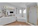 Bathroom features double vanity, corner tub, and shower at 1320 Indian Hedge Dr, North Las Vegas, NV 89032