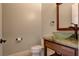 Powder room with modern vanity and vessel sink at 1323 Red Baron Ln, Boulder City, NV 89005