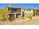 Stunning home with a stone wall and private balcony at 1323 Red Baron Ln, Boulder City, NV 89005