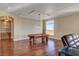 Game room with pool table and hardwood floors at 1323 Red Baron Ln, Boulder City, NV 89005