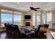 Relaxing living area with a fireplace and leather seating at 1323 Red Baron Ln, Boulder City, NV 89005