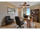 Home office with built-in bookcase and hardwood floors at 1323 Red Baron Ln, Boulder City, NV 89005