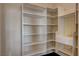 Bright walk-in pantry with ample shelving at 1323 Red Baron Ln, Boulder City, NV 89005