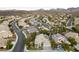 Aerial view of a house in a residential neighborhood with a pool and solar panels at 1350 Rossini St, Henderson, NV 89052