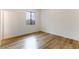 Bright bedroom featuring light wood flooring and large window at 1350 Rossini St, Henderson, NV 89052