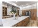 Modern kitchen with large island, white marble countertops, and stainless steel appliances at 1350 Rossini St, Henderson, NV 89052