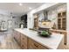 Modern kitchen with large island, marble countertops and stainless steel appliances at 1350 Rossini St, Henderson, NV 89052