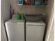 Laundry room with washer, dryer, and shelving at 1405 S Nellis Blvd # 1090, Las Vegas, NV 89104