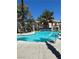 Inviting community pool with surrounding patio at 1405 S Nellis Blvd # 1090, Las Vegas, NV 89104