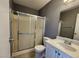 Clean bathroom with shower and white vanity at 1480 Hialeah Dr # B, Las Vegas, NV 89119