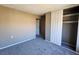 Bedroom with double door closet and gray carpet at 1480 Hialeah Dr # B, Las Vegas, NV 89119