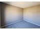 Simple bedroom with gray walls and gray carpet at 1480 Hialeah Dr # B, Las Vegas, NV 89119