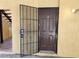 Building entrance with a secure door and gate at 1480 Hialeah Dr # B, Las Vegas, NV 89119