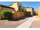 Residential building with a wooden fence and walkway at 1480 Hialeah Dr # B, Las Vegas, NV 89119