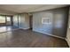 Living room with gray walls and tiled floor at 1480 Hialeah Dr # B, Las Vegas, NV 89119