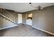 Living room with gray walls, tiled floor, and laundry area at 1480 Hialeah Dr # B, Las Vegas, NV 89119