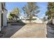 Landscaped backyard with flagstone patio at 1614 Redhawk Ct, Henderson, NV 89074