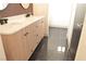 Double vanity bathroom with light wood cabinets at 1804 Piccolo Way, Las Vegas, NV 89146