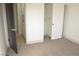 Bright bedroom with closet and neutral carpeting at 1804 Piccolo Way, Las Vegas, NV 89146