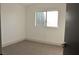 Simple bedroom with neutral carpeting and window at 1804 Piccolo Way, Las Vegas, NV 89146