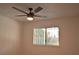 Bright bedroom with ceiling fan and window at 1804 Piccolo Way, Las Vegas, NV 89146