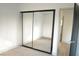 Bedroom with mirrored closet doors and neutral carpeting at 1804 Piccolo Way, Las Vegas, NV 89146